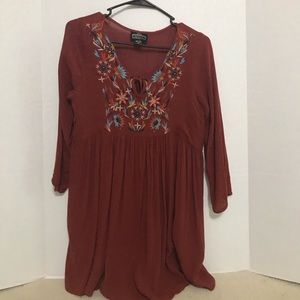 Red embroidered tunic